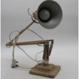 A cream painted angle poise desk lamp