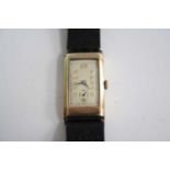 An Art Deco gent's 9ct gold cased tank watch, having unsigned silvered Arabic dial, subsidiary