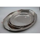 Three silver plated serving trays, largest 61x42cm