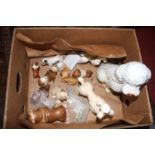 A collection of vintage pottery models of dogs