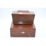 An early Victorian rosewood tea caddy of sarcophagus form on bun feet, width 28cm; together with a