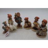 A collection of six Goebel figures of children, the largest h.13cm