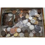 A collection of British & world coinage to include George III token, Spanish 1870 2 pesetas, Early