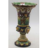 A Victorian Minton vase of trumpet shape having relief floral decoration with further frieze of lion