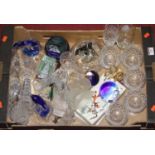 A box of miscellaneous items, to include a Caithness glass paperweight engraved with dolphins,