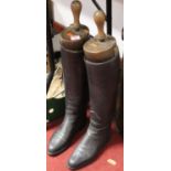 A pair of black leather riding boots with treeswooden boot tree foot 46cm longBoot 27cm long heel to