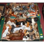 A large collection of various animal figures, mostly being dogs, to include Staffordshire greyhounds