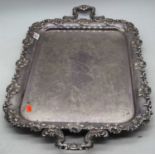 A silver plated serving tray, relief decorated with trailing vines, 64x39cm