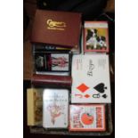 A collection of novelty playing cards and card games to include Lexicon, Bezique, Poker & novelty