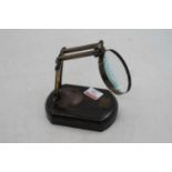 A reproduction adjustable table-top magnifying glass, approx h.26cm