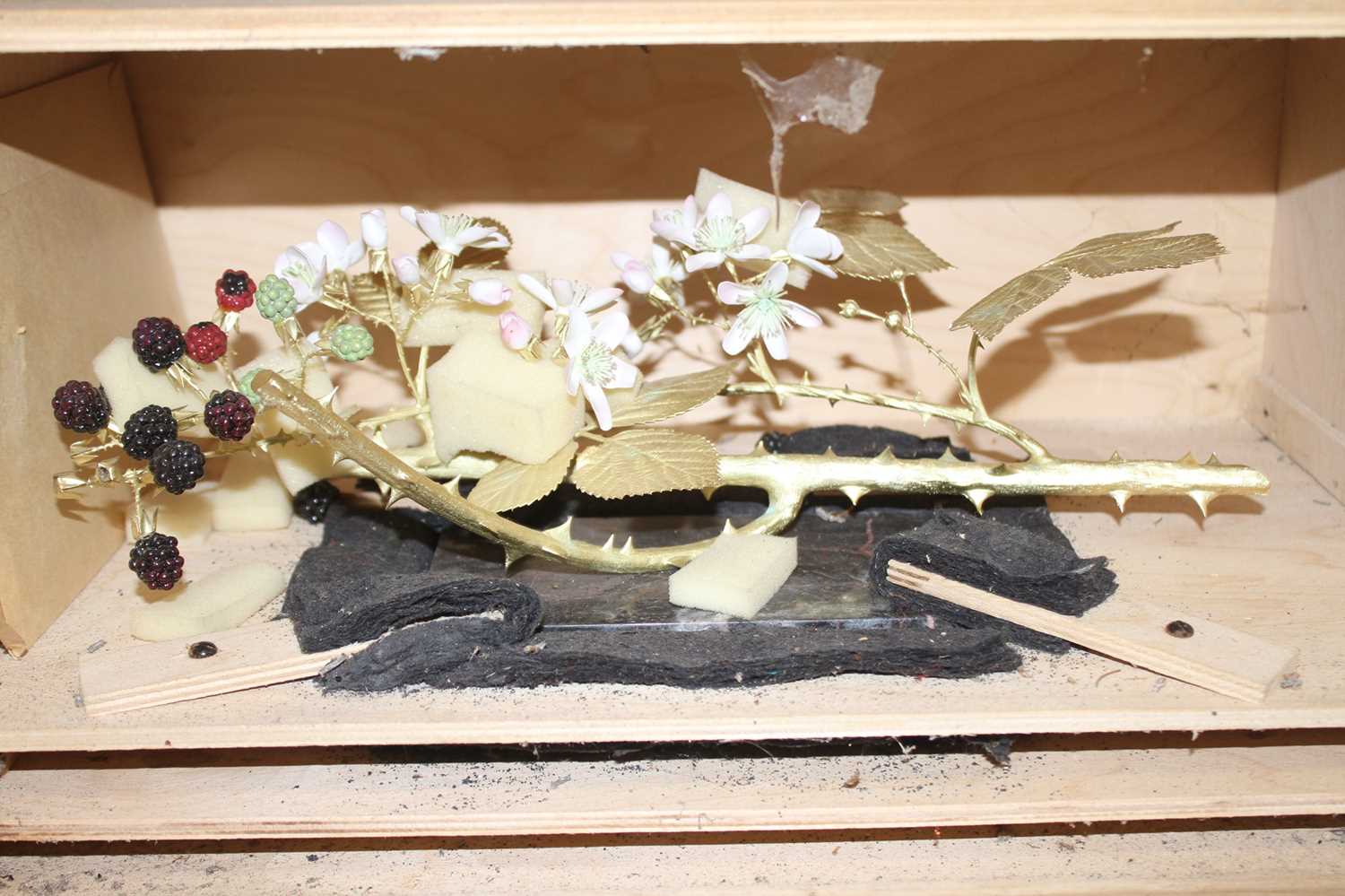 Ronald van Ruyckevelt, a bone china and gilt bronzed model of a blackberry branch, on a marble