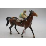 A Beswick racehorse and jockey, model No.1037, brown gloss, h.21cm