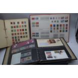 A collection of vintage commonwealth stamps, mainly housed within albums