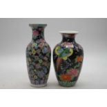 A Chinese export famille noir vase, of baluster form, enamel decorated with flowers, h.26cm;