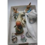 A collection of ceramic items, to include Lladro porcelain geese,Goebel and Beswick Peter Rabbit