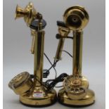 A reproduction brass stick telephone together with one other similar (2)