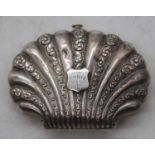 An early 20th century white metal lady's purse, of fan shape, having a shield shaped cartouche