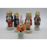 A Victorian Staffordshire Toby figural pepperpot, h.14cm; together with four other similar (5)