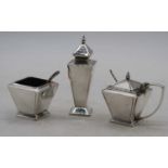 An Art Deco three-piece silver plated table cruet set, the largest h.11cm