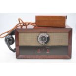 A vintage rotary loud-speaking telephone, w.37cm