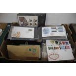 A large collection of First Day Covers, some housed in albums