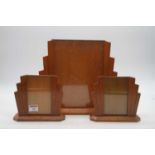 An Art Deco oak photo frame of shaped angular form, width 31cm, together with a pair of smaller