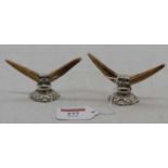 A pair of antler and silver plated knife rests, h.5.5cm