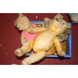 A collection of vintage teddy-bears, to include a blond mohair exampleEach bear in very poor