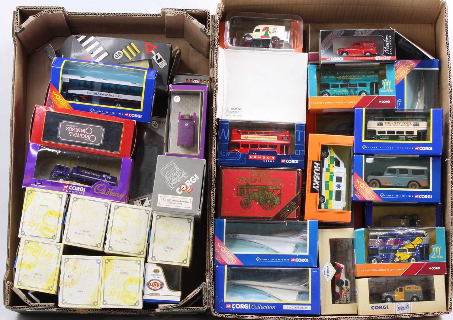 Two trays containing a large selection of various Corgi, Matchbox Models of Yesteryear and similar