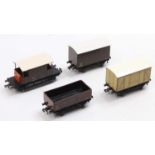 Four post-war Hornby-Dublo Southern goods wagons: open; meat van; goods van & goods brake. Both vans