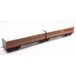 Pair of Gauge 1, 10mm scale scratch-built GNR twin articulated set in the simulated teak finish,