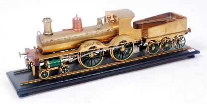 From Freelance Designs 4.5" gauge spirit-fired model of a 4-4-0 locomotive and tender, named "