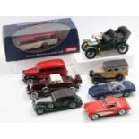 A collection of 1/24 scale Franklin Mint, Danbury Mint, and a Schuco 1/43 scale diecast group, to