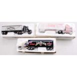 A collection of three boxed Matchbox Models of Yesteryear tractor unit and trailer diecast to