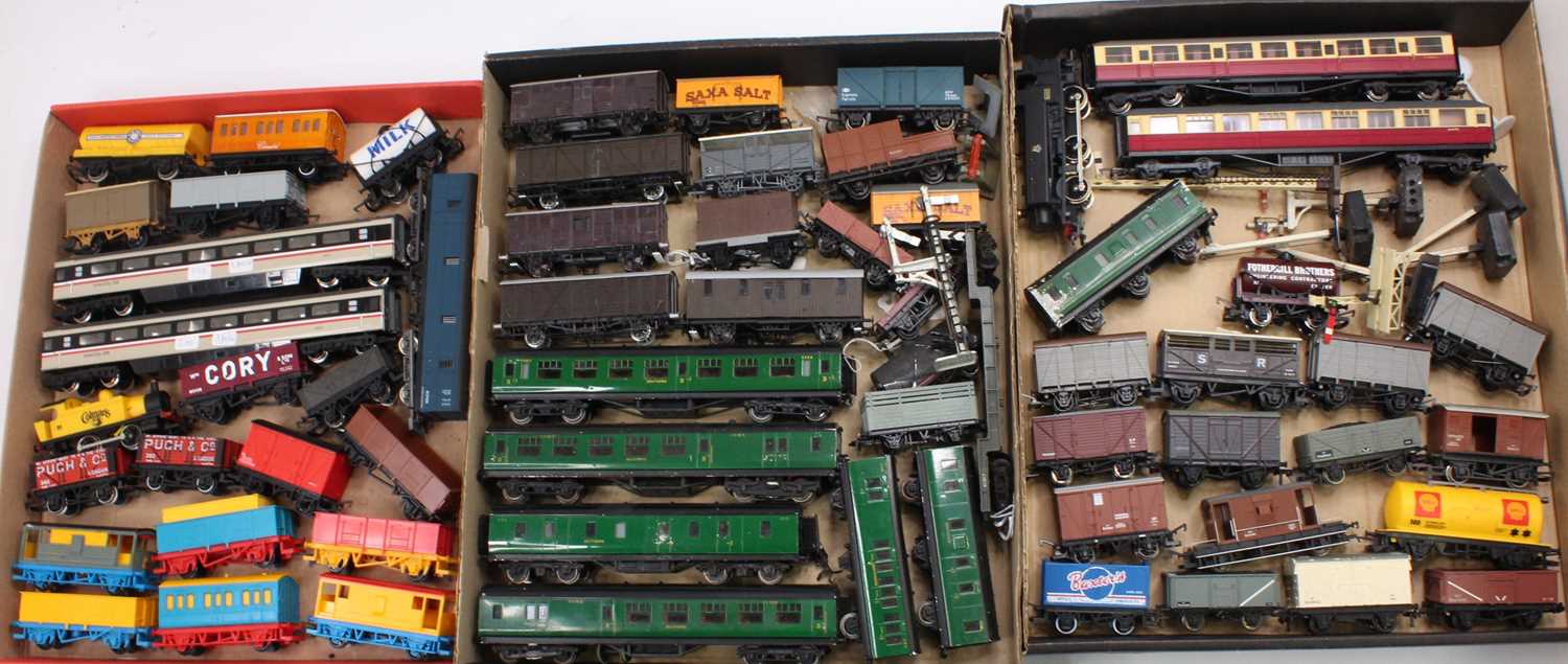 Three trays of 00 gauge items of rolling stock and locomotives to include Exley, Bachmann, Lima, and