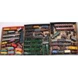 Three trays of 00 gauge items of rolling stock and locomotives to include Exley, Bachmann, Lima, and