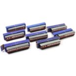 Eight Hornby-Dublo D13 tinplate suburban coaches, maroon. Four each 1st/3rd & br/3rd. All metal