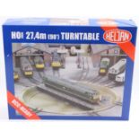 A Heljan boxed HO scale DCC ready 27.4m (90) turntable, appears as issued, and housed in the