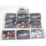 Ten boxed and plastic cased Minichamps and Spark 1/43 scale F1 racing diecast and resin models to