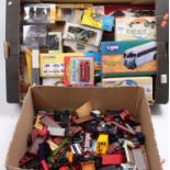 Two trays containing a collection of mixed modern issue and vintage diecast models to include a