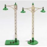 Two Hornby repainted electric lamps, green bases, lamp shades & finials on white lattice posts.