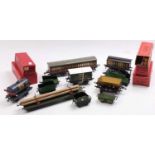 Various items of Hornby 0-gauge rolling stock: Carr’s Biscuit van, open axle-guard, repainted