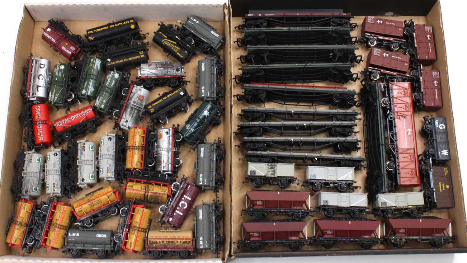 Two trays containing a collection of mixed 00 gauge items of rolling stock to include Fena, LMS,