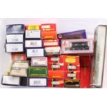 33 various boxed 00 gauge wagons and triple packs, to include Bachmann, Wrenn and Hornby