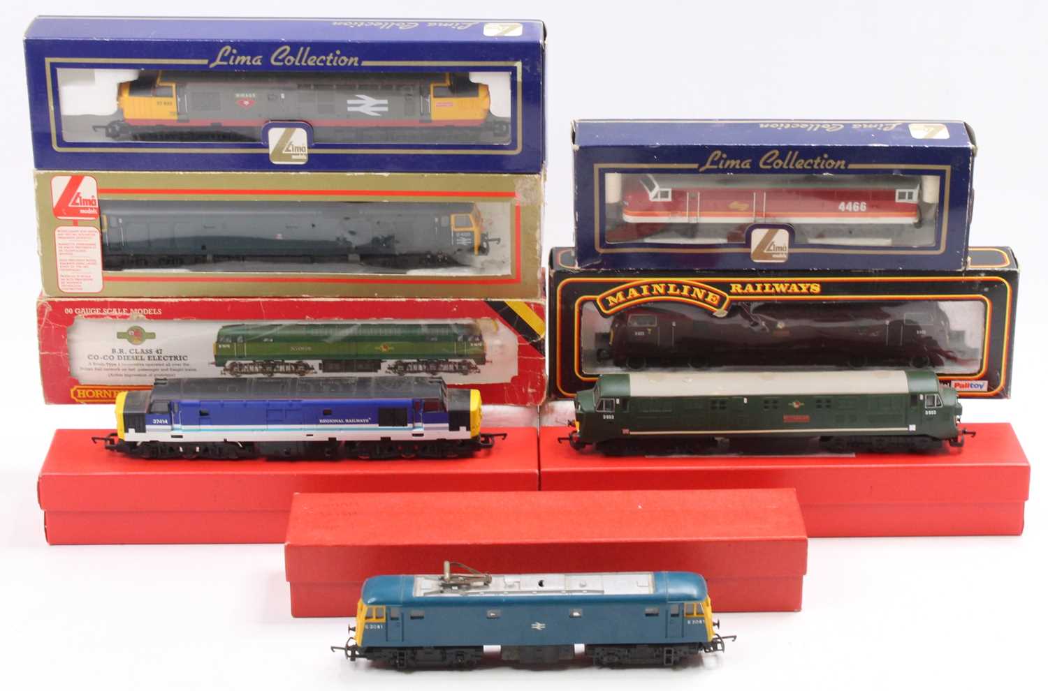 One tray containing a collection of various boxed and loose diesel outline HO scale locomotives,