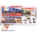 Two Hornby Train sets: R1139 ‘Blue Rapier’ containing driving car, dummy driving car, one centre