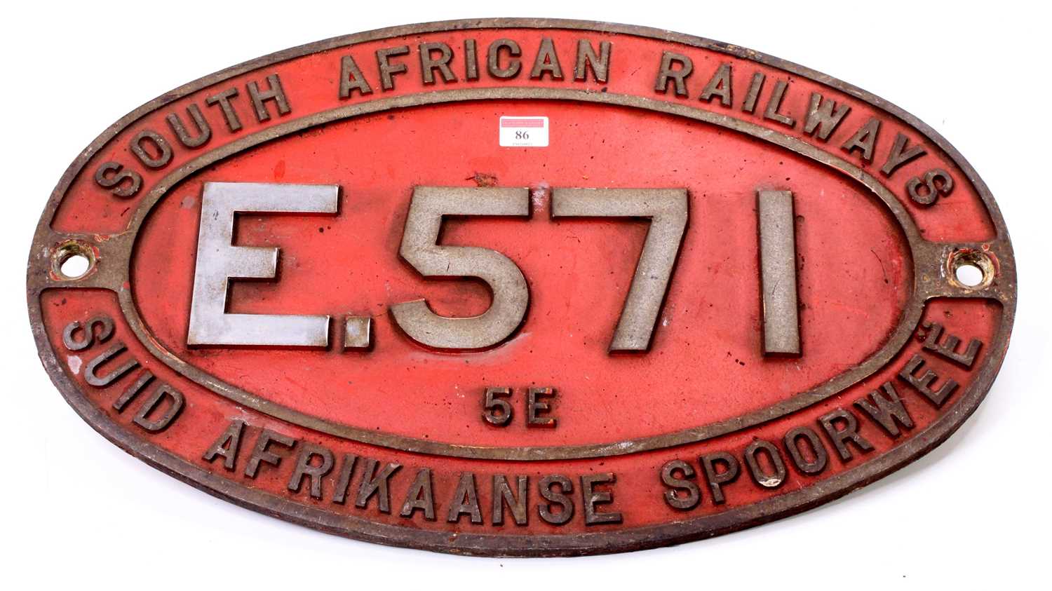 A South African Railways original cast iron E.571 Class 5E diesel locomotive number plate, oval