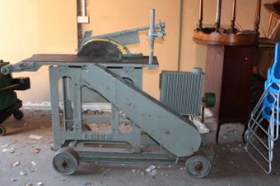 A Lister D powered Liner Saw Bench, hand painted in grey with the original blade, free running