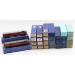 A large plastic box containing 29 Hornby-Dublo tinplate coaches, all blue or blue/white boxes. A