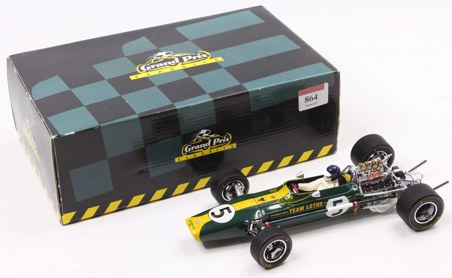 An Exoto Grand Prix Classics 1/18 scale model of a Lotus 49 No. 5 F1 race car, finished in yellow